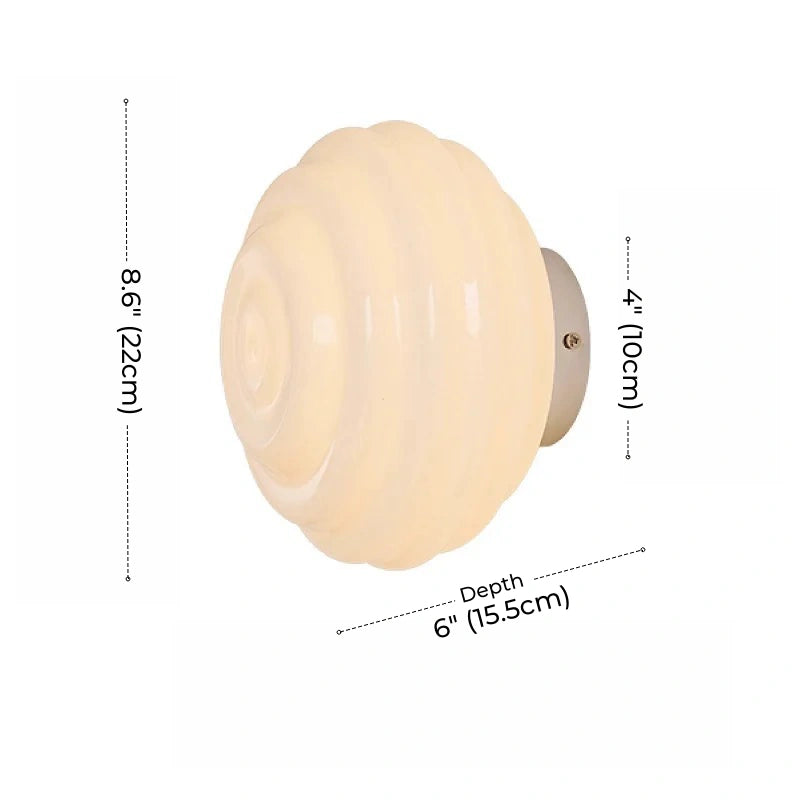 Zierliche Wandleuchte aus Grübchenglas